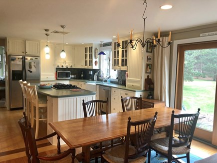 Katama-Edgartown, Edgartown- 1 mile to town  Martha's Vineyard vacation rental - Dining room with seating for 8 opens to patio for dining and sofa