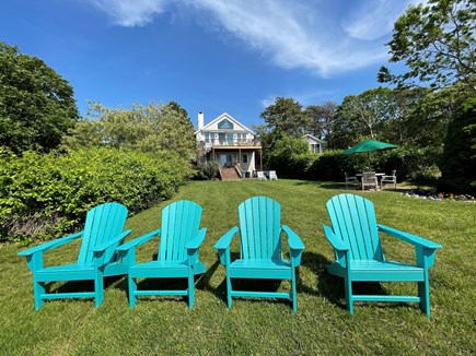 Oak Bluffs, Lagoon Pond Waterfront - salt Martha's Vineyard vacation rental - Back of house facing water... comfortable adirondack chairs