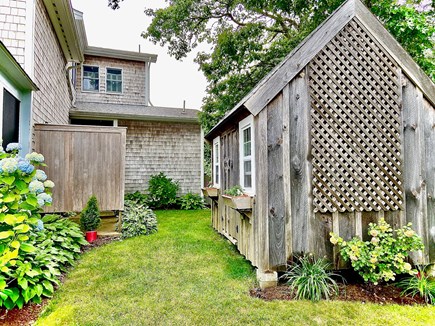 Edgartown Martha's Vineyard vacation rental - Outdoor shower on left. Bike shed on right