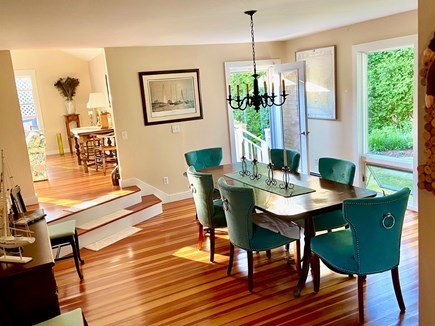 Edgartown Martha's Vineyard vacation rental - Dining room off of kitchen leads to living room, back deck, yard.