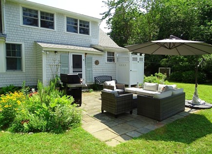 Oak Bluffs, East Chop Martha's Vineyard vacation rental - Close up of patio showing seating area, grill and outdoor shower