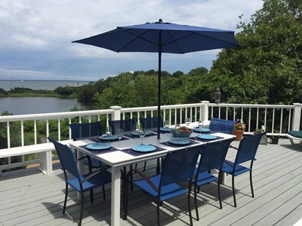 Oak Bluffs - East Chop Martha's Vineyard vacation rental - Outdoor Deck Dining w/ Vineyard Sound and Crystal Lake Views