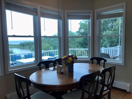 Oak Bluffs - East Chop Martha's Vineyard vacation rental - Dining area Ocean views over deck and Crystal Lake