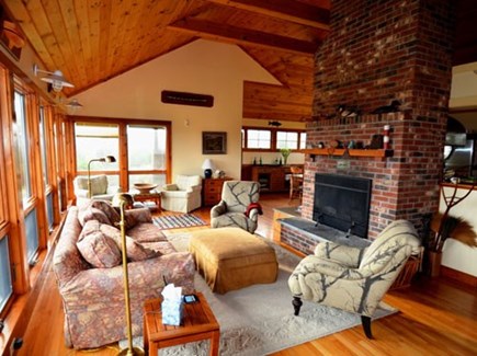 Chilmark Martha's Vineyard vacation rental - Vaulted ceiling living room with brickwork fire place.