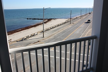 Oak Bluffs Martha's Vineyard vacation rental - A view of the beach (and bike path) from the balcony.