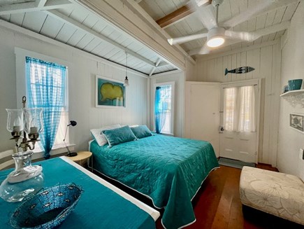 Oak Bluffs Martha's Vineyard vacation rental - Downstairs queen bedroom with door to the deck sits next to bath