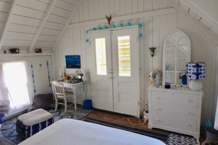 Oak Bluffs Martha's Vineyard vacation rental - Primary bedroom boasts attached porch, with enough room for two.