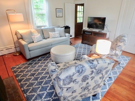 Edgartown Martha's Vineyard vacation rental - Cozy living room with television off the kitchen area.