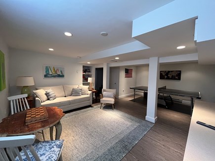 Edgartown Martha's Vineyard vacation rental - Lower level with desk, TV, pullout couch and ping pong table