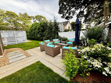 Oak Bluffs Martha's Vineyard vacation rental - Patio surrounded by colorful flowers and shrubs.