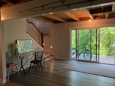 West Tisbury Martha's Vineyard vacation rental - Downstairs sitting area new floor in 2020, desk and cozy TV area