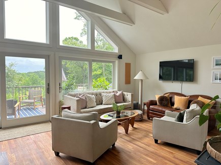 West Tisbury Martha's Vineyard vacation rental - Living room with cathedral ceiling and views over the back field.