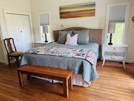 West Tisbury Martha's Vineyard vacation rental - Primary Bedroom ensuite, sliders to back deck, view to field