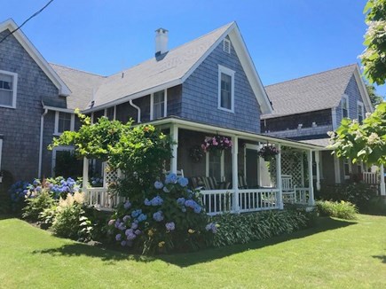 Oak Bluffs Martha's Vineyard vacation rental - Front porch and lawn showing house next door