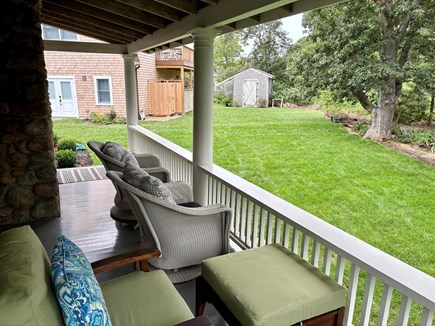 Oak Bluffs, East Chop Martha's Vineyard vacation rental - Wraparound porch view of backyard (outdoor shower on garage)