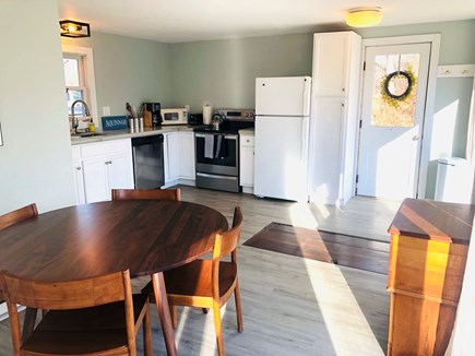 Aquinnah Martha's Vineyard vacation rental - Eat in kitchen with sliding glass doors opening onto side porch.
