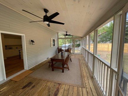 Oak Bluffs Martha's Vineyard vacation rental - Covered, screened in porch with antique farmers table