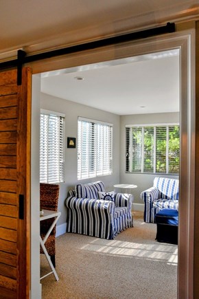 Edgartown, Katama Martha's Vineyard vacation rental - Barn door separates the sun room from the dining room