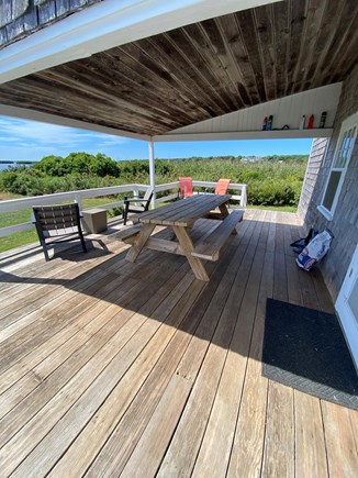 Chilmark, The Camp // Gadget Martha's Vineyard vacation rental - Covered deck with views of the pond
