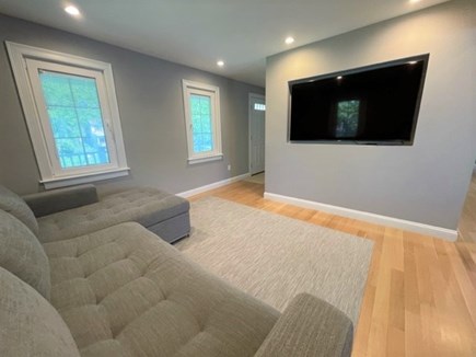 Edgartown Martha's Vineyard vacation rental - Separate den off dining area with cozy couch & big screen TV