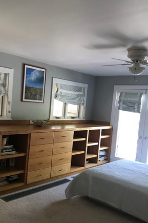 West Tisbury Martha's Vineyard vacation rental - Master bedroom with queen bed, lots of storage, and deck access.