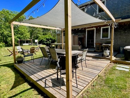 Chilmark Martha's Vineyard vacation rental - Outdoor dining with grill and fun overhead lighting