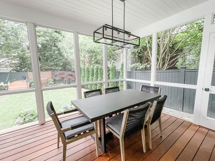 Edgartown Martha's Vineyard vacation rental - Screened in Porch Dining Area