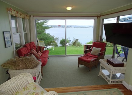 Oak Bluffs, On Lagoon Pond Martha's Vineyard vacation rental - Sun room with sliders to back yard, water views, TV