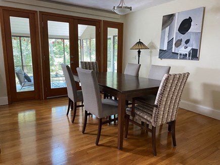 Oak Bluffs Martha's Vineyard vacation rental - Dining room with access to screen porch, hardwood floors and A/C
