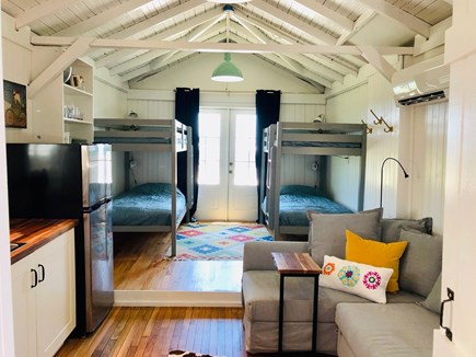 Oak Bluffs Martha's Vineyard vacation rental - View from kitchen to bunk-beds (French doors to deck/ocean view)