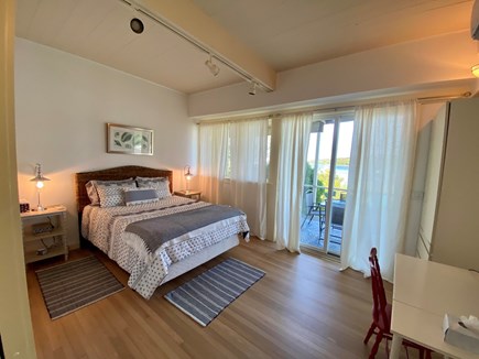 Vineyard Haven, Lagoon Frontage  Martha's Vineyard vacation rental - Primary bedroom below with deck