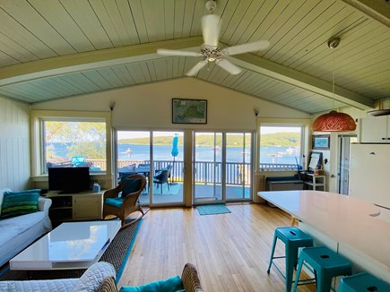 Vineyard Haven, Lagoon Frontage  Martha's Vineyard vacation rental - Open living room- kitchen area leading to the deck