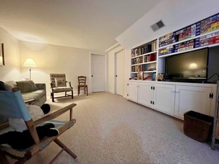 Edgartown Martha's Vineyard vacation rental - Basement living area with second t.v., puzzles and couch.