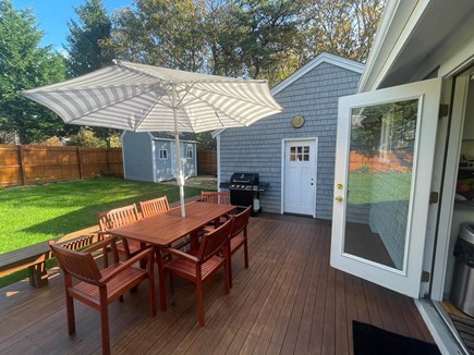 Oak Bluffs Martha's Vineyard vacation rental - Deck with table, chairs, umbrella, Beautiful yard