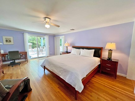 Edgartown Martha's Vineyard vacation rental - Master bedroom with desk and slider access to outdoor shower.