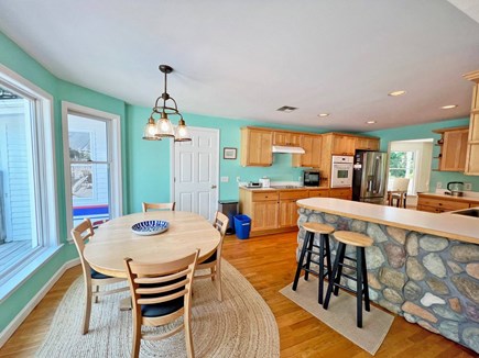 Edgartown Martha's Vineyard vacation rental - Second view of kitchen with table and bar stools.