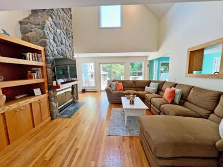 Edgartown Martha's Vineyard vacation rental - Living room with couch seating for 6+ w/ large TV above fireplace