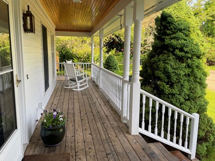Edgartown Martha's Vineyard vacation rental - Partial view of front wraparound porch with rocking chairs.