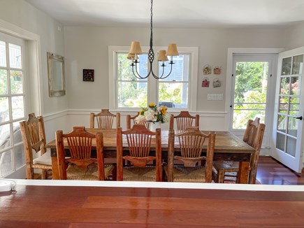 Edgartown Martha's Vineyard vacation rental - Dining room opens out to screen porch.