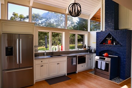 Oak Bluffs Martha's Vineyard vacation rental - Light filled Kitchen, door to covered outdoor sitting porch area