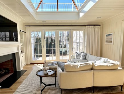 Edgartown Village Martha's Vineyard vacation rental - Den area with wood burning fireplace opens to outside space.
