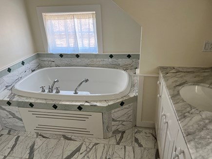 Chilmark: Quansoo Bright and A Martha's Vineyard vacation rental - Upstairs Primary bath with Jacuzzi Tub