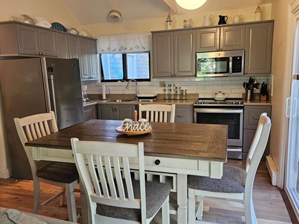 Edgartown Martha's Vineyard vacation rental - Full view of kitchen immediately off of wraparound deck.