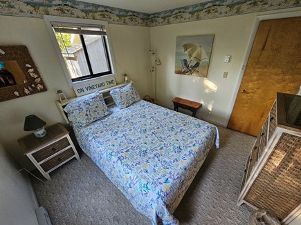 Edgartown Martha's Vineyard vacation rental - Serenity awaits - downstairs bedroom with queen bed and TV.