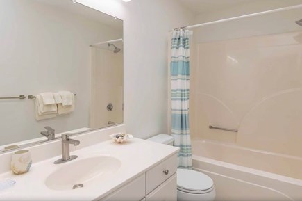 Oak Bluffs Martha's Vineyard vacation rental - First floor guest bathroom with bathtub, shower and skylight