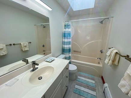 Oak Bluffs Martha's Vineyard vacation rental - First Floor Guest Bathroom with Bathtub, Shower and Skylight