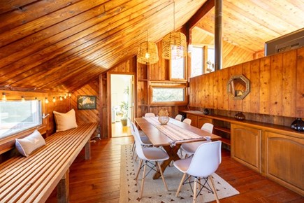 West Tisbury Martha's Vineyard vacation rental - Dining area with large bench in original part of house