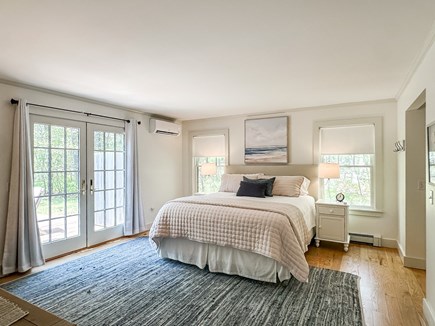 Oak Bluffs Martha's Vineyard vacation rental - Primary bedroom with en suite bath and sliders to deck