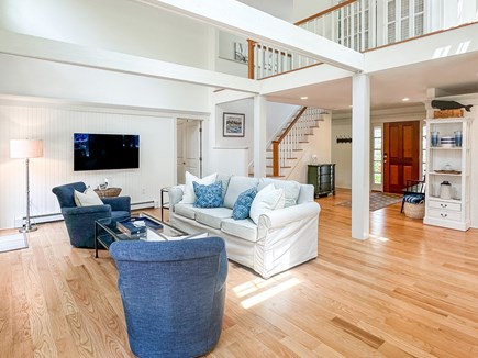 Oak Bluffs Martha's Vineyard vacation rental - Living room with stairs to upstairs guest bedrooms