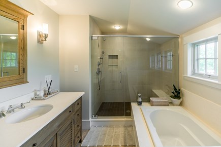 Edgartown Martha's Vineyard vacation rental - Primary bedroom en suite with shower and tub